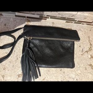Roots crossbody